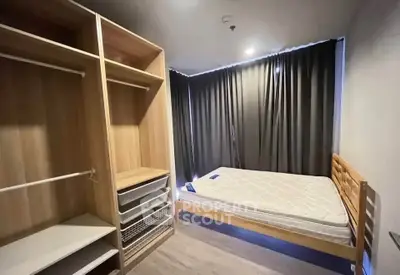 Spacious bedroom with built-in wardrobe and cozy lighting