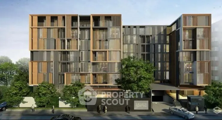 Modern apartment building with contemporary design and lush greenery