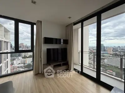 Stunning corner unit living room with panoramic city views and floor-to-ceiling windows.