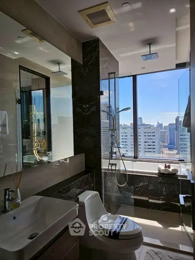 Luxurious bathroom with city view, featuring modern fixtures and elegant design.