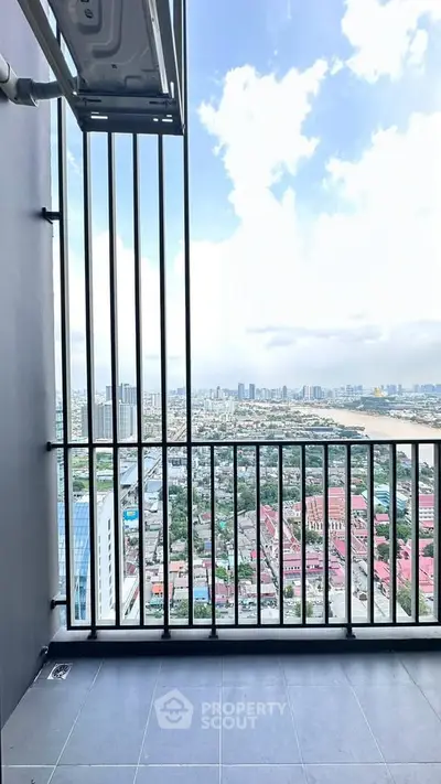 Stunning high-rise balcony with panoramic city views, perfect for urban living enthusiasts.