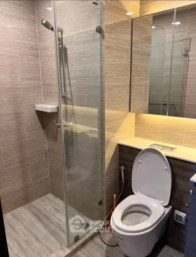 Modern bathroom with glass shower and sleek design