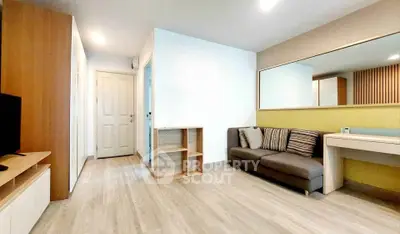Modern living room with stylish decor and ample natural light