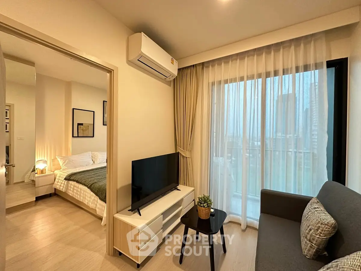 Modern apartment living room with cozy decor and city view