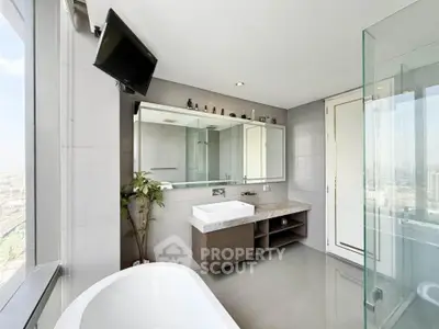 Luxurious bathroom with city view, modern fixtures, and elegant design.