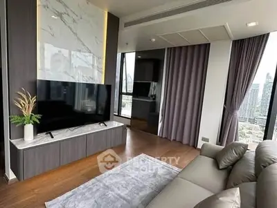 Luxurious modern living room with city view, sleek furniture, and elegant decor.