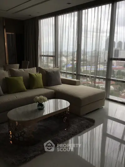 Luxurious living room with panoramic city view and elegant decor