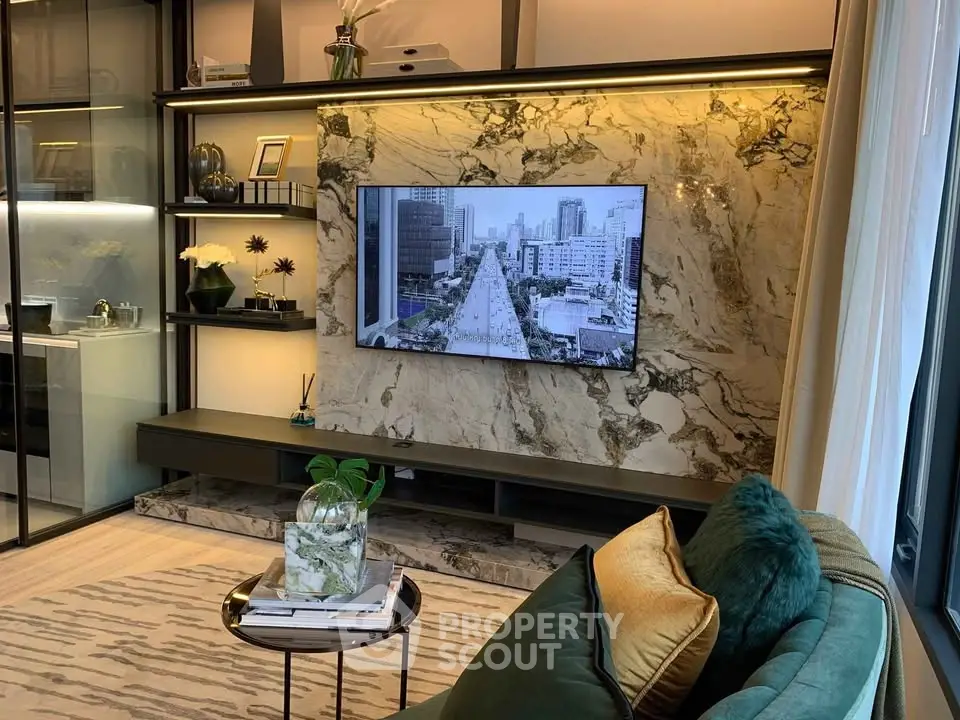 Luxurious living room with marble accent wall and modern decor