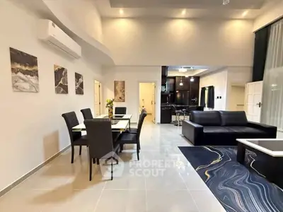 Spacious modern living room with elegant dining area and stylish decor