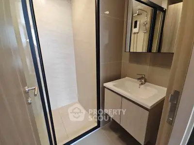 Modern bathroom with sleek design and spacious shower area