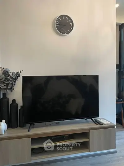 Modern living room with sleek TV setup and stylish decor