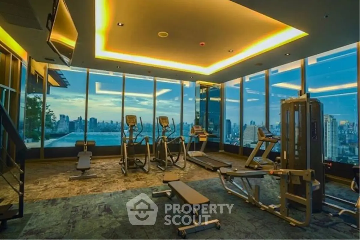 Luxury gym with panoramic city views and modern equipment