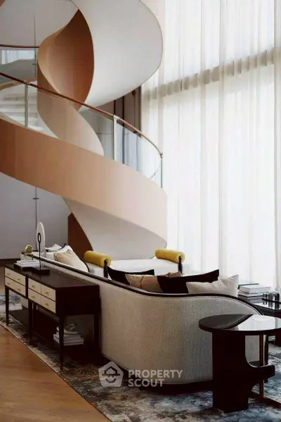 Luxurious living room with modern spiral staircase and elegant furnishings.