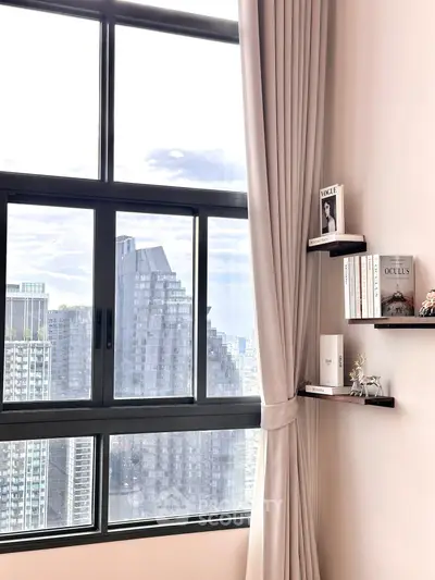 Modern high-rise apartment with stunning city view and elegant interior decor.