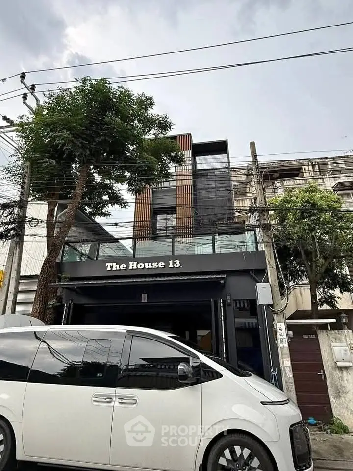 Modern urban townhouse with sleek design and street view