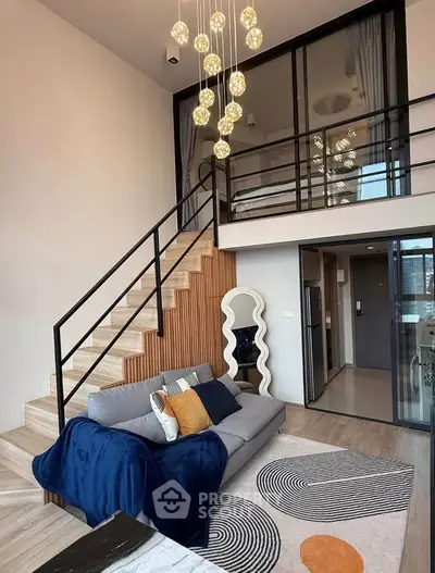 Modern loft-style living room with mezzanine, stylish decor, and elegant lighting in a contemporary apartment.