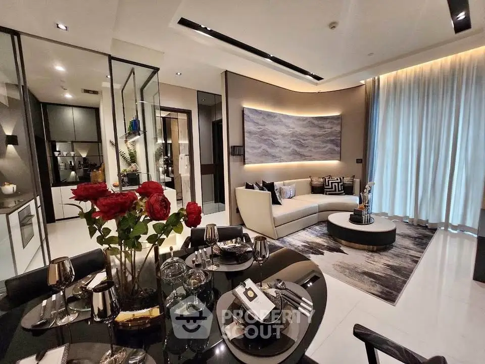 Luxurious modern living room with elegant decor and open kitchen layout