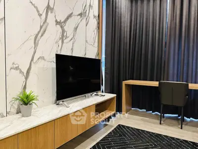 Modern living room with sleek TV stand and elegant marble wall design