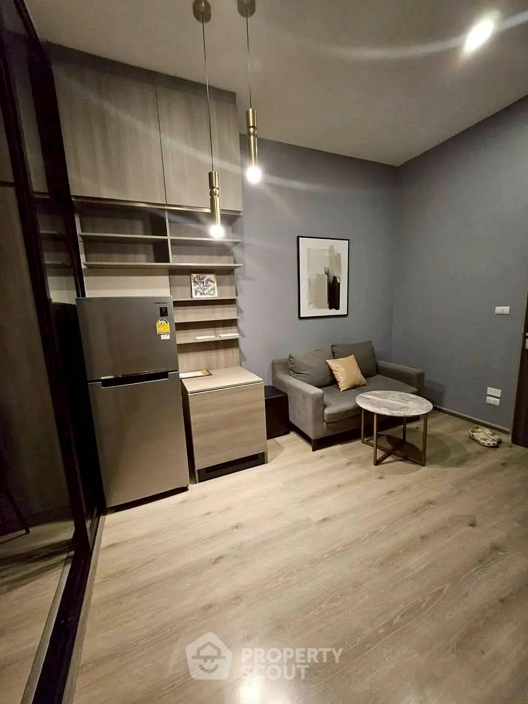 Modern living room with sleek furniture and stylish lighting