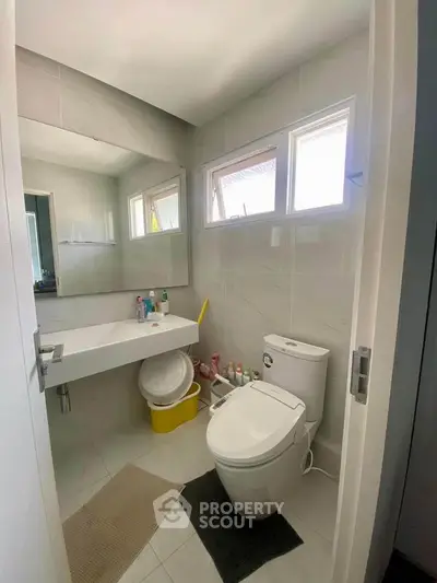 Modern bathroom with sleek fixtures and natural light
