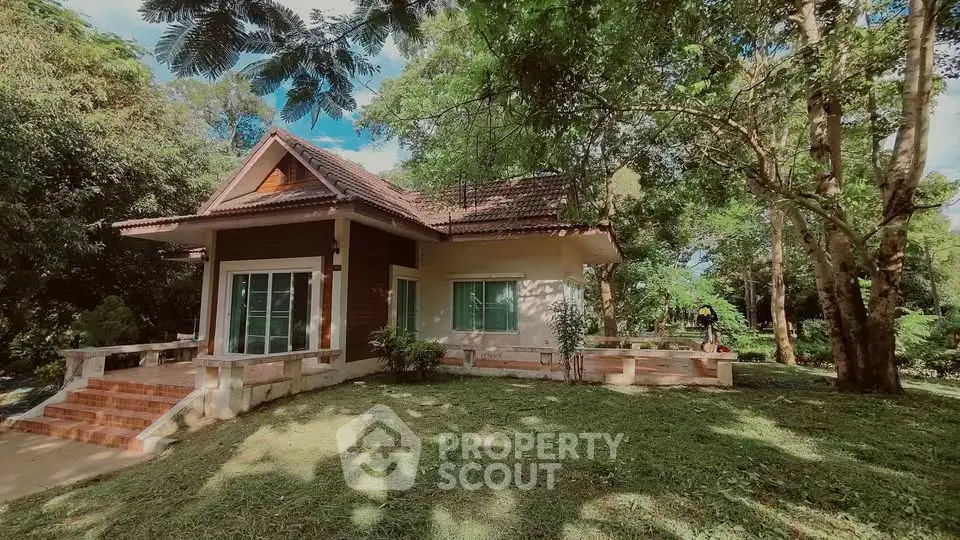 Charming single-story house with lush garden and serene surroundings