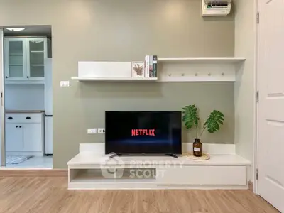Modern living room with sleek TV setup and stylish decor