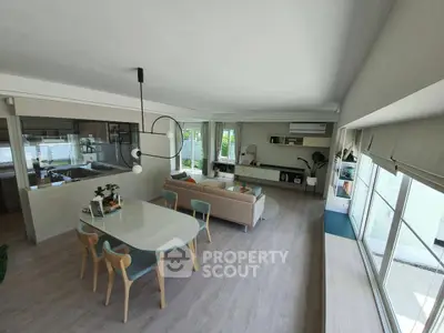 Spacious modern living room with open layout and stylish furniture