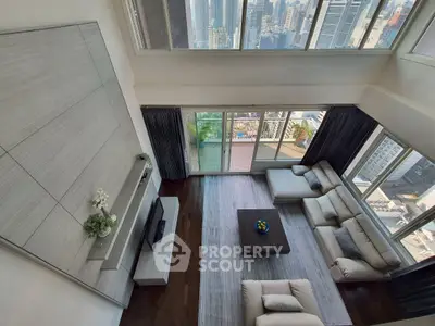 Luxurious high-rise living room with stunning city view and modern decor