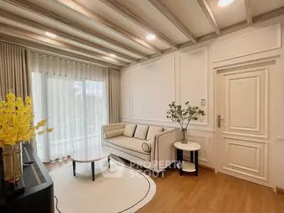 Elegant living room with modern decor and natural light