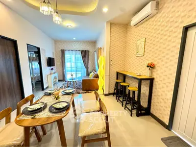 Modern living and dining area with stylish decor and natural light