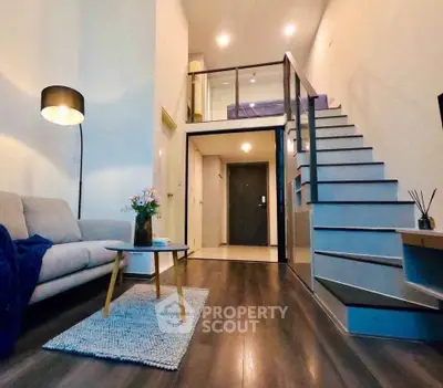 Modern loft apartment with stylish living room and mezzanine bedroom