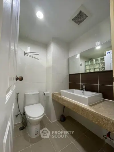 Modern bathroom with sleek fixtures and elegant tile design