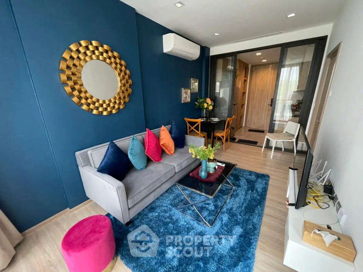 Stylish modern living room with vibrant decor and cozy seating area
