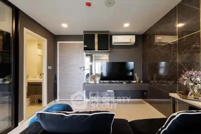 Modern living room with sleek design and wall-mounted TV