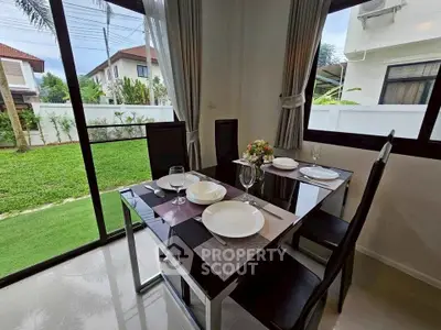 Elegant dining area with garden view in modern home