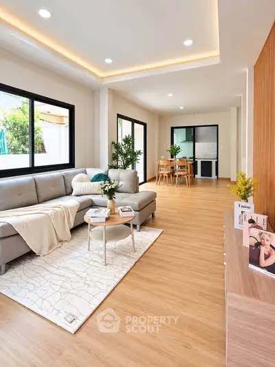 Spacious modern living room with elegant decor and natural light