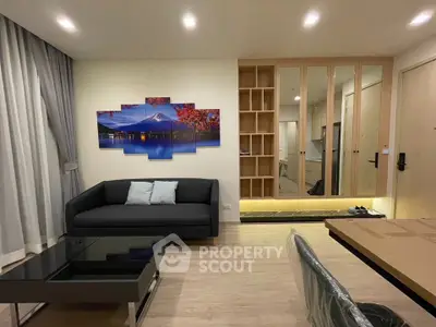Modern living room with stylish decor and ample storage space