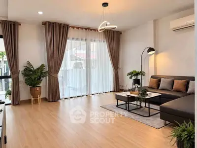 Spacious modern living room with elegant decor and natural light