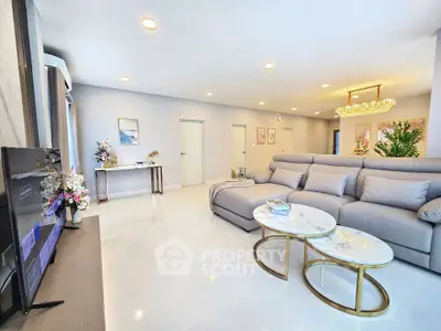 Spacious modern living room with elegant decor and plush seating