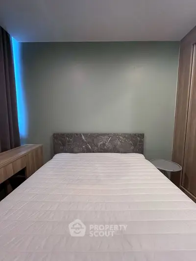 Modern bedroom with minimalist design and stylish headboard