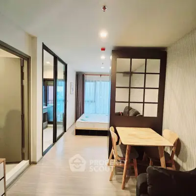 Modern apartment interior with cozy dining area and bedroom view