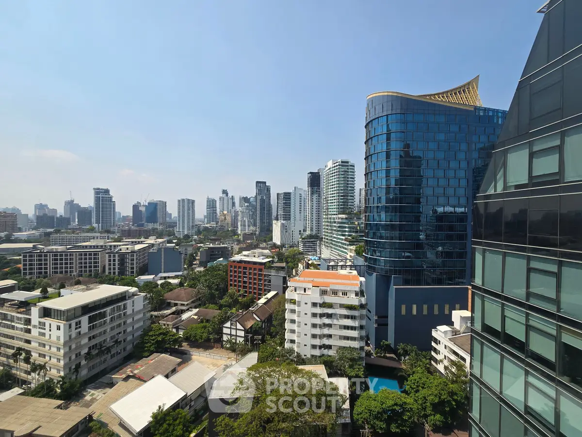 Stunning cityscape view with modern high-rise buildings and lush greenery, perfect for urban living enthusiasts.