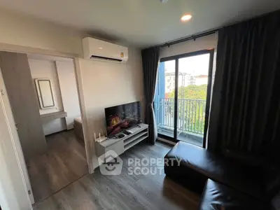 Modern living room with balcony view in stylish apartment