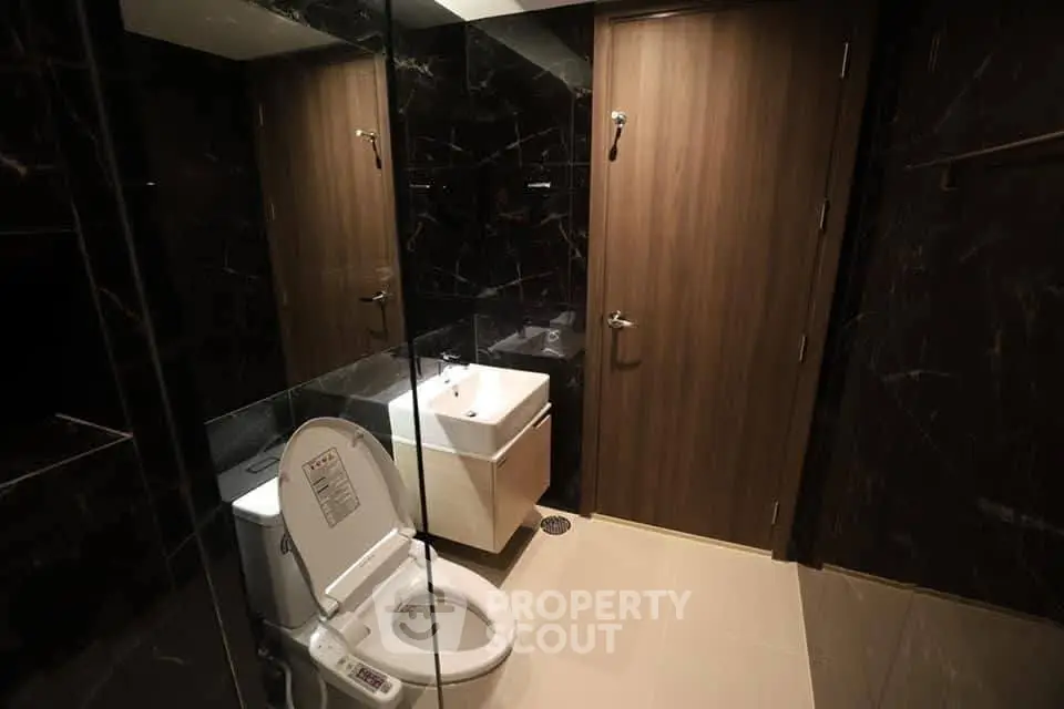 Luxurious modern bathroom with sleek design and high-end fixtures.