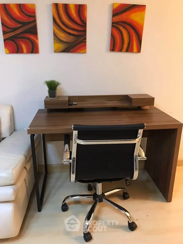 Modern home office setup with sleek desk and ergonomic chair