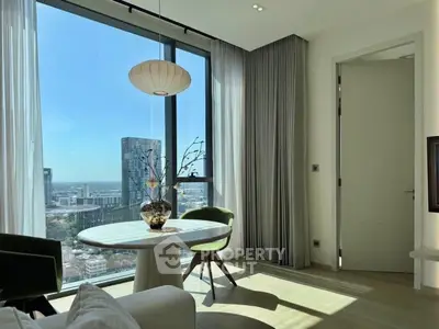 Modern living room with panoramic city view and stylish decor