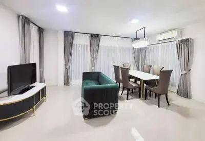 Spacious modern living room with elegant dining area and stylish furniture