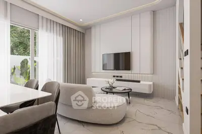 Modern living room with sleek furniture and large window offering natural light.