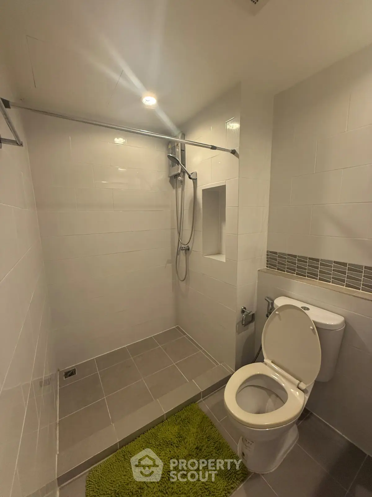 Modern bathroom with walk-in shower and sleek tile design