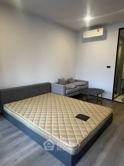 Modern bedroom with minimalist design and comfortable furnishings